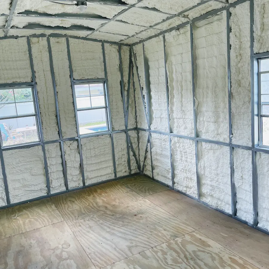 Closed-cell spray foam insulation applied to wall cavities in a residential project in Orrville